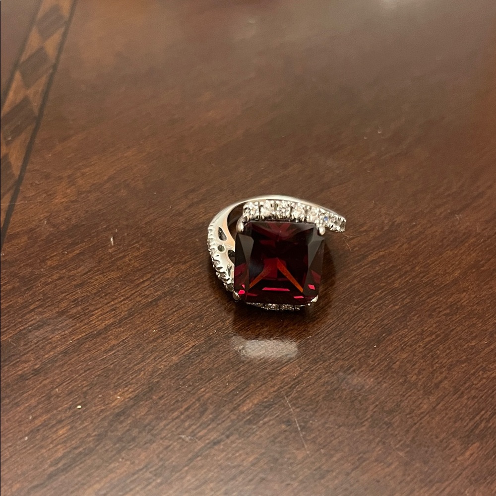 Red Man Made Garnet Stone set in Genuine Sterling Silver Setting with 24 CZs